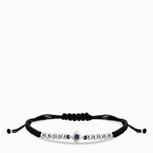 bracciale laccio in oro bianco con punto luce zaffiro centrale