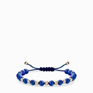 bracciale laccio con ceramica blu in oro giallo con palline diamantate