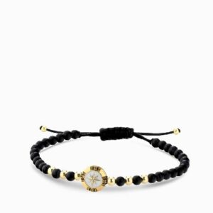 bracciale monetina in oro giallo con onice e diamanti neri rosa dei venti