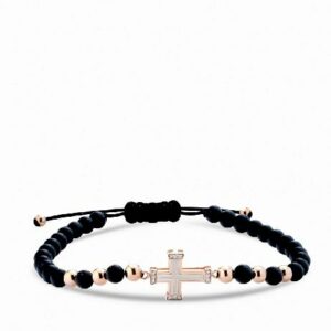 bracciale in oro rosa con croce smaltata bianca e diamanti con onice