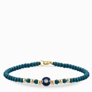 bracciale laccio in oro giallo con ematite blu e centrale monetina con diamante