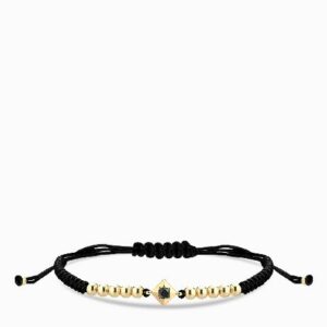 bracciale laccio in oro giallo con punto luce di diamnte nero centrale