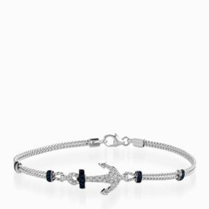 bracciale rigido in oro bianco con ancora centrale di diamanti e zaffiri