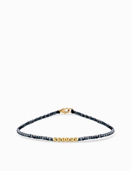 bracciale con emtatite in oro giallo e laccio