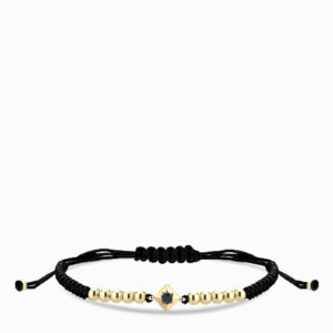 bracciale laccio in oro giallo con punto luce zaffiro centrale
