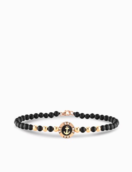 bracciale in oro con ancora e cerchio in diamanti neri