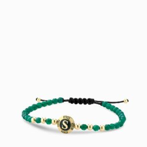 bracciale a monetina in oro giallo con smeraldi e lettera personalizzata
