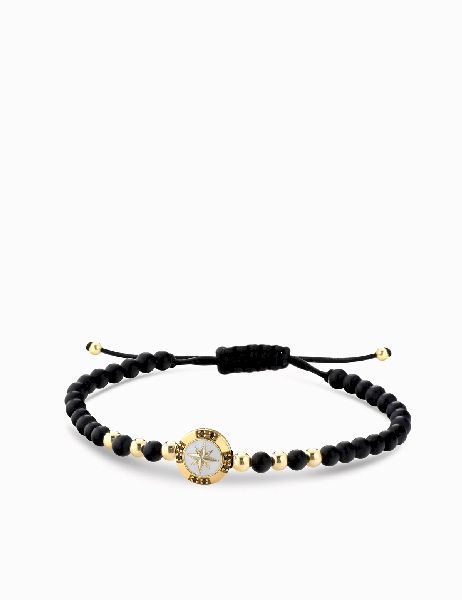 bracciale monetina in oro giallo con onice e diamanti neri rosa dei venti