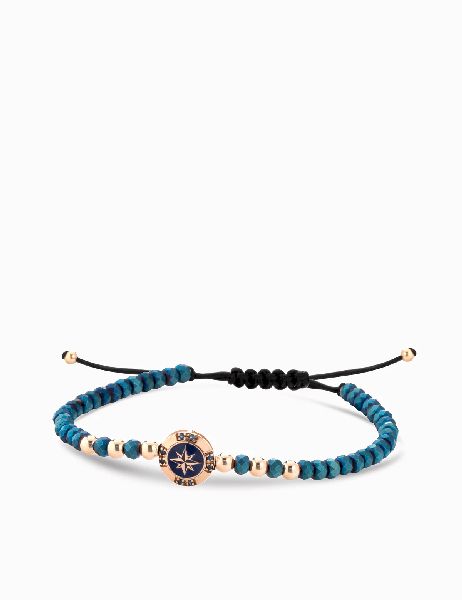 bracciale a monetina in oro rosa con zaffiri e rosa dei venti ed ematite blu