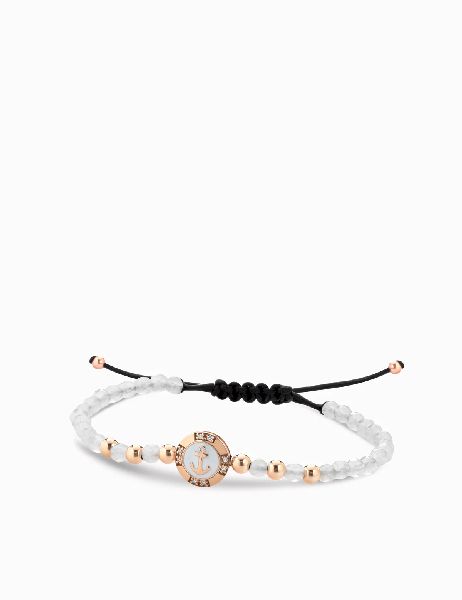 bracciale a monetina in oro rosa con diamanti e ancora ed ematite bianca