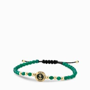 bracciale a monetina in oro giallo con diamanti e ancora ed ematite verde