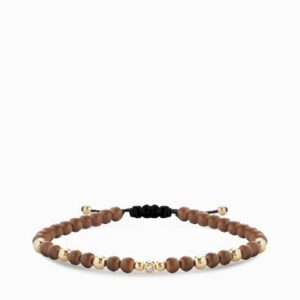 bracciale in oro giallo con diamantino e onice marrone