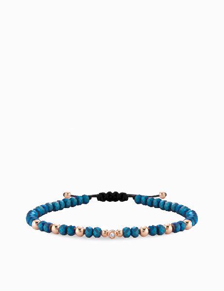 bracciale in oro rosa con diamantino ed ematite blu