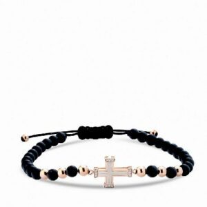 bracciale in oro rosa con croce smaltata bianca e diamanti con onice