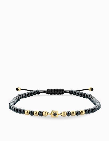 bracciale laccio con ematite grigia in oro giallo e punto luce centrale di diamante nero