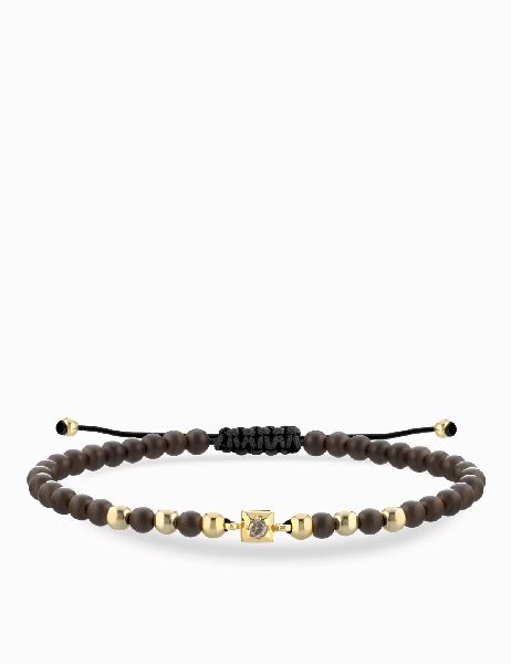 bracciale laccio con ematite marrone in oro giallo punto luce centrale con diamante brown