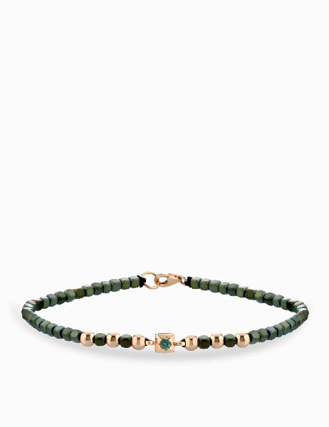 bracciale laccio con ematite verde in oro rosa e punto luce di smeraldo
