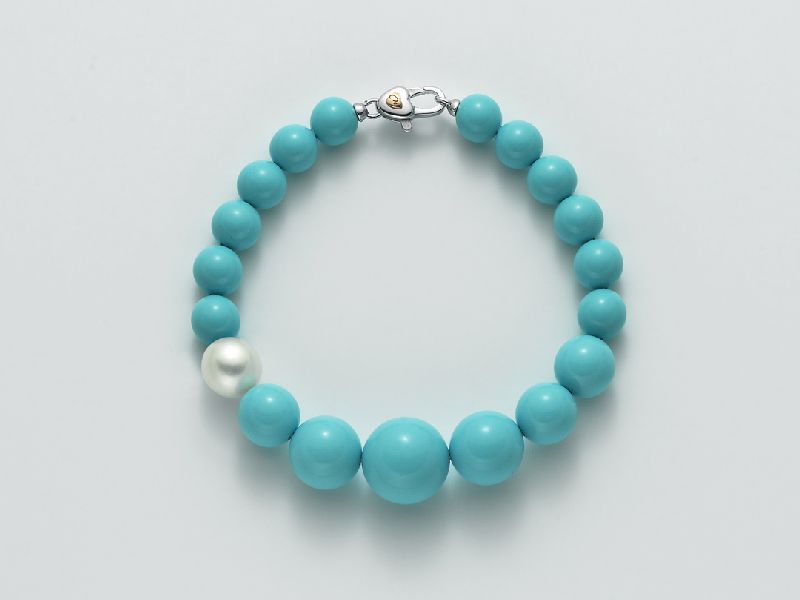 Bracciale in aulite di diverse dimensioni turchese con perla bianca