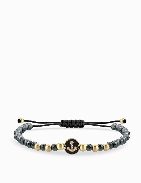 bracciale laccio con ematite in oro giallo con monetina centrale e ancora di diamanti