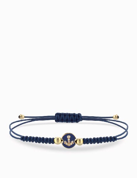 bracciale laccio blu in oro giallo con monetina centrale e ancora di diamanti