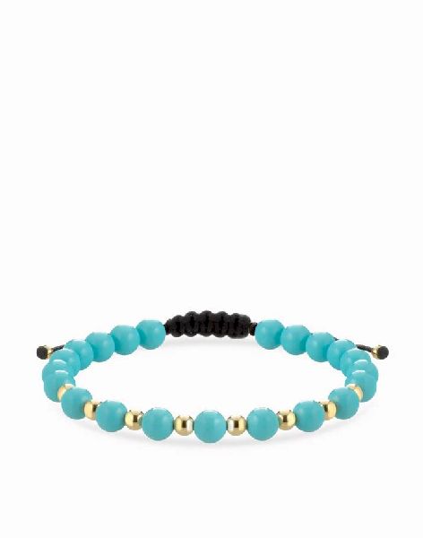 bracciale con sfere in ceramica azzurra e oro giallo 1