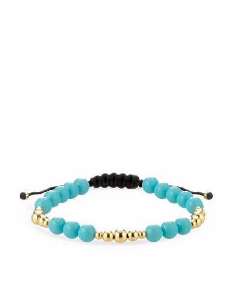 bracciale con sfere in ceramica azzurra e oro giallo
