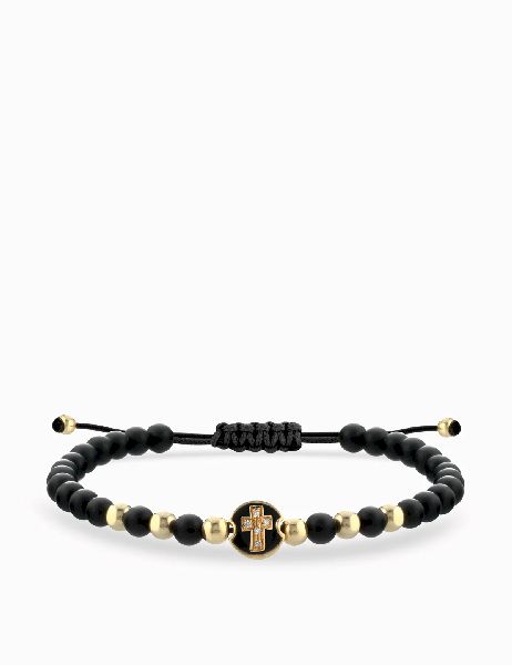 bracciale laccio in oro giallo con onice monetina centrale con croce e diamanti
