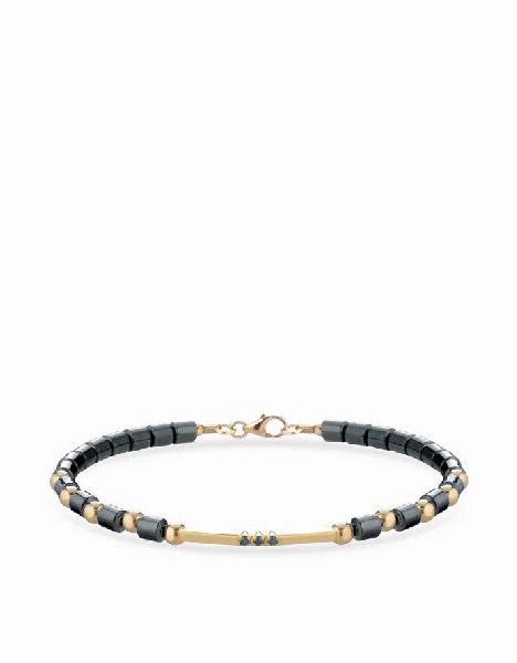 bracciale con ematite e sfere in oro giallo con bacchetta smile pietre verdi