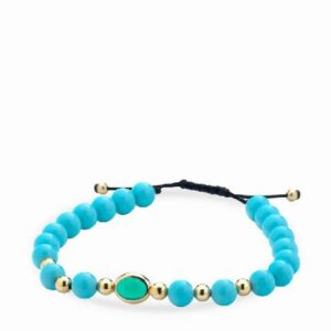 bracciale con sfere in ceramica azzurra e oro giallo con pietra centrale verde