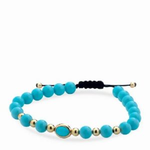 bracciale con sfere in ceramica azzurra e oro giallo e pietra centrale azzurra