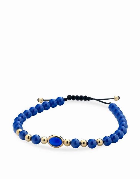 bracciale con sfere in ceramica blu e oro giallo e pietra centrale blu
