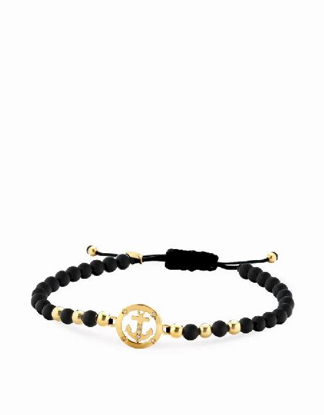 bracciale in cordino con sfere in onice e oro giallo ancora e diamanti 1