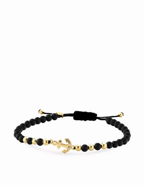 bracciale in cordino con sfere in onice e oro giallo ancora e diamanti