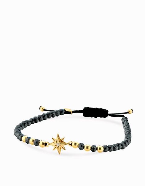 bracciale in cordino ematite briole sfere e rosa dei venti in oro giallo e diamante