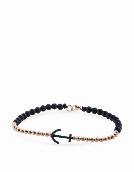 bracciale con chiusura in cordino sfere in onice e oro giallo e ancora in diamanti neri