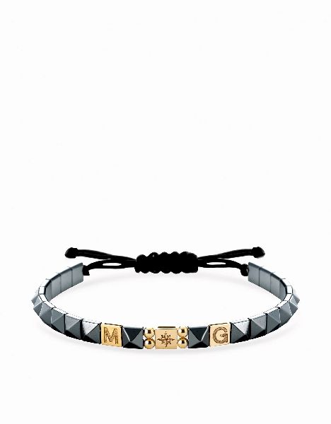bracciale in cordino personalizzabile con ematite piramidale e inserti in oro giallo rosa dei venti