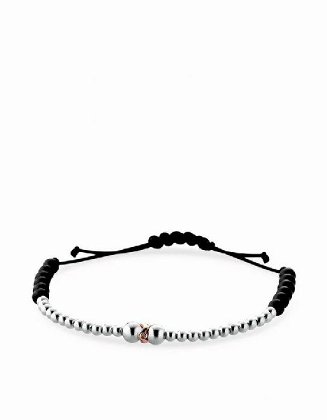 bracciale in cordino con sfere oro bianco onice e rondella diamanti