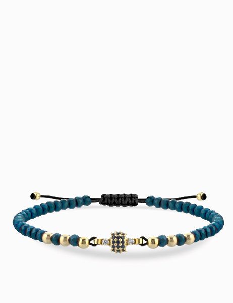 bracciale laccio in oro giallo con ematite blu e centrale di diamanti e zaffiri