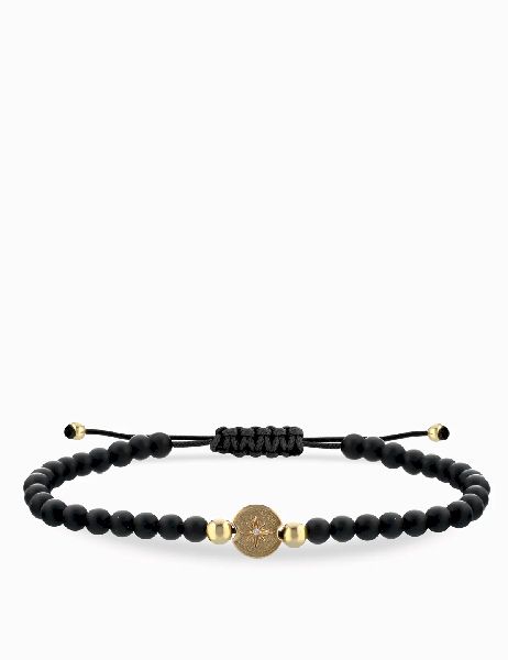 bracciale laccio onice in oro giallo con monetina rosa dei venti centrale