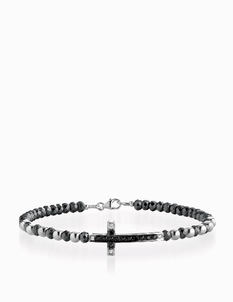 bracciale rigido in oro bianco con croce centrale di diamanti e diamanti neri