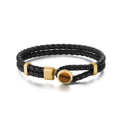 Bracciale in pelle di colore nero con elementi in acciaio 316L e finitura pvd oro 14K con occhio di tigre giallo.
Misura: 195