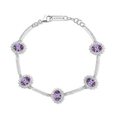 Bracciale Kate semirigido in argento rodiato 925‰ con oval cubic zirconia chiari e colore amethyst.