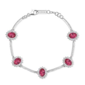 Bracciale Kate semirigido in argento rodiato 925&permil; con oval cubic zirconia chiari e colore ruby.