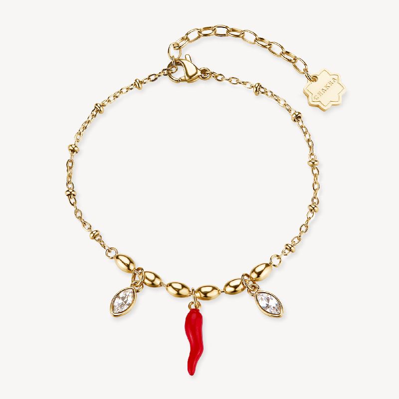 Bracciale CHAKRA in acciaio 316L, finitura pvd colore oro, con cornetto smaltato e cristalli
