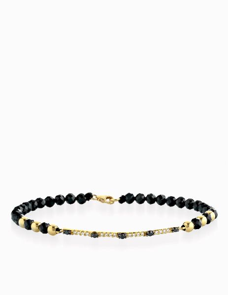 bracciale con laccio e chiusura in oro giallo bacchetta di diamanti e diamanti neri