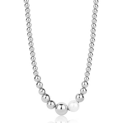 Collana girocollo in acciaio 316L e perla di conchiglia.