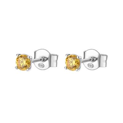 Orecchini a lobo in argento rodiato 925‰ con round cubic zirconia colore golden yellow.