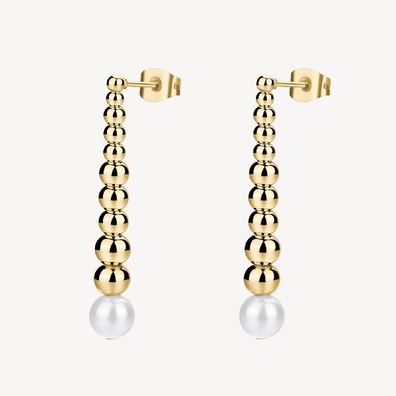Orecchini pendenti in acciaio 316L e finitura pvd oro 14K, con perla di conchiglia.