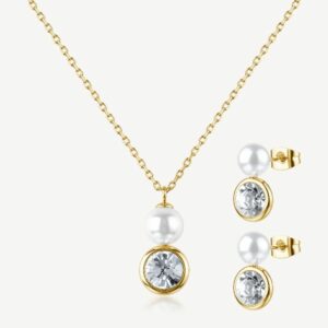Set collana e orecchini LIMITED EDITION in acciaio 316L e finitura pvd oro 14K, con cristalli e perle di conchiglia.