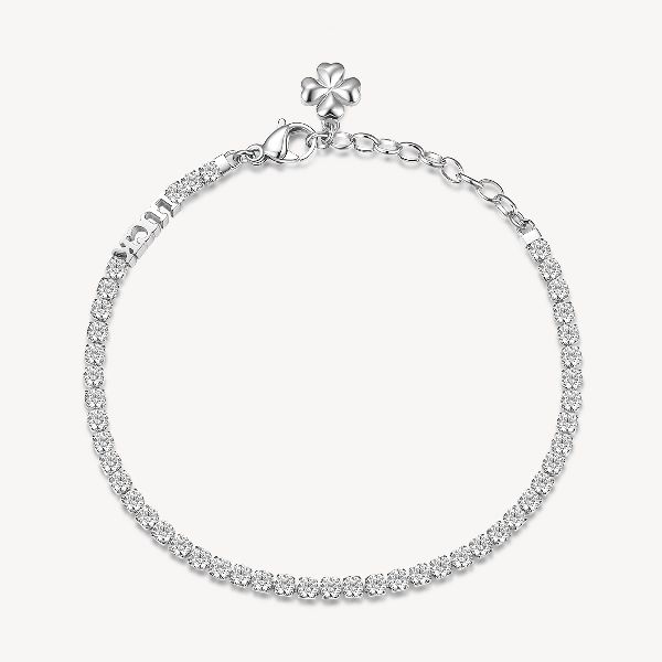 Bracciale tennis in acciaio 304 e cubic zirconia con scritta luck e pendente chiusura con quadrifoglio.